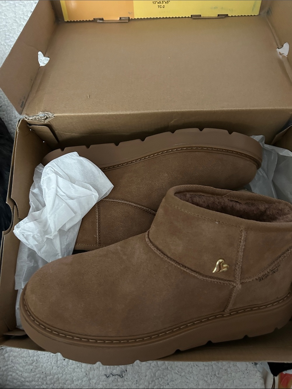 Skechers Slip ins Keepsake ankle boots.